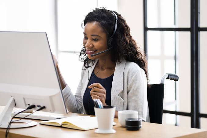 Business owner adding a virtual assistant as a user in QuickBooks Online with restricted permissions