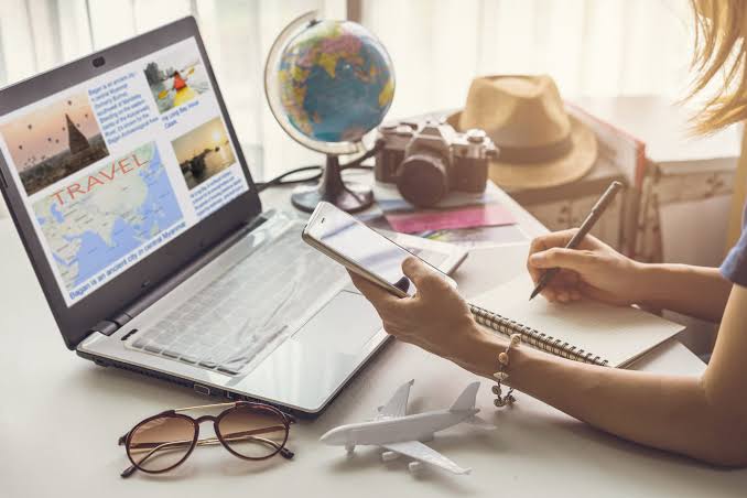 Virtual assistant working out travel plans for an executive