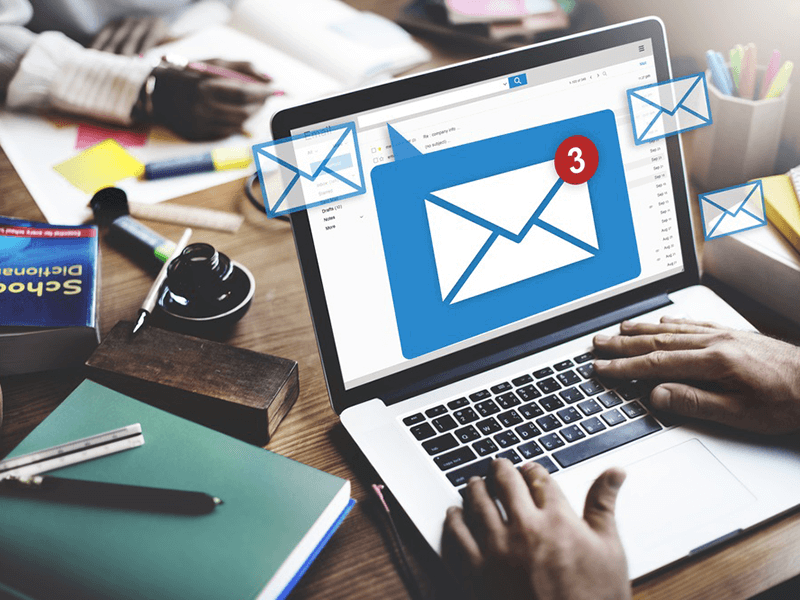 Executive assistant sorting and managing an email inbox